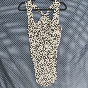 Kiwi Tops - White and black animal print tank top, 92% polyester. Size- L